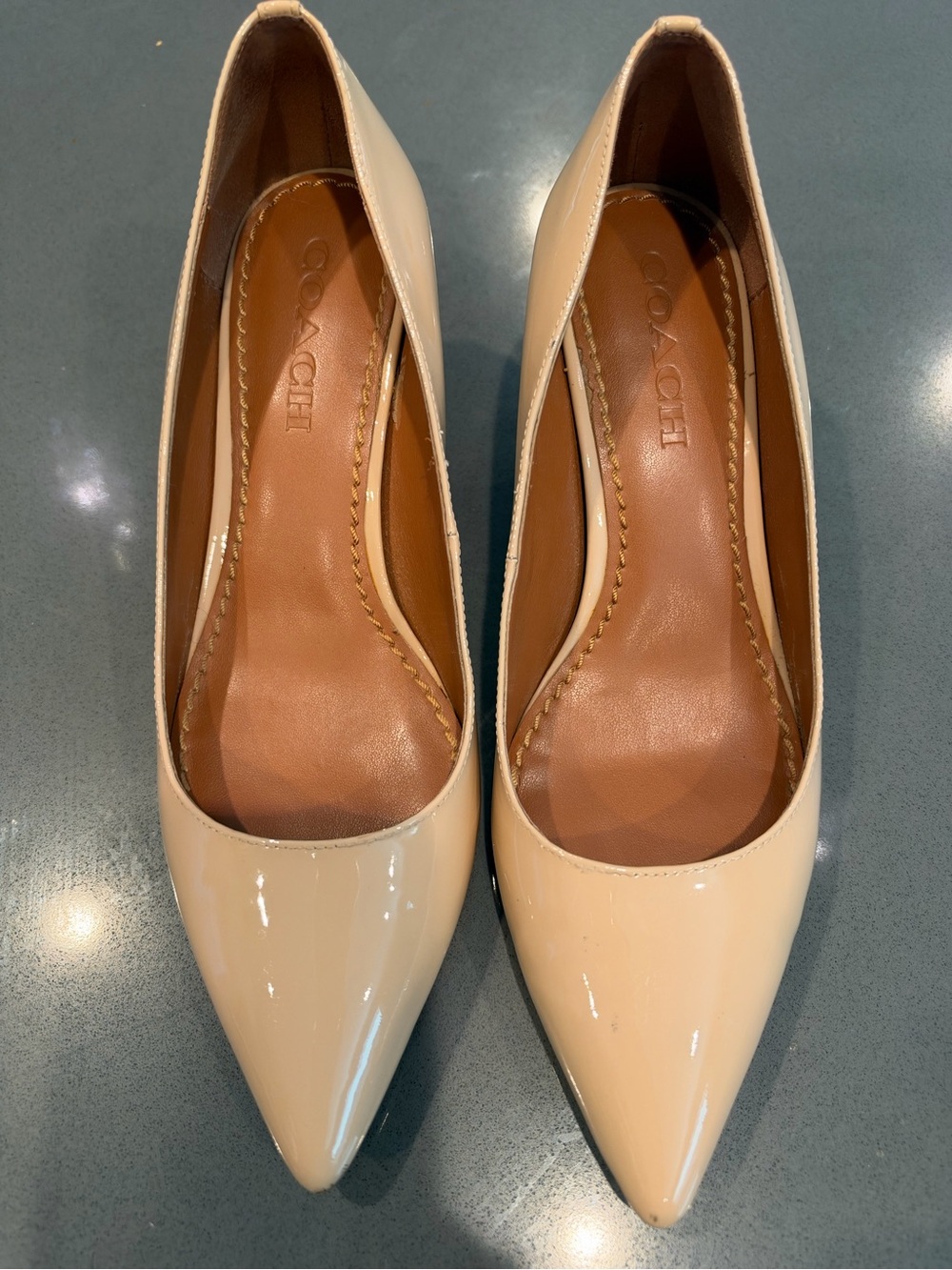 Coach Patent Leather Pointed Toe Pumps in Nude Beige